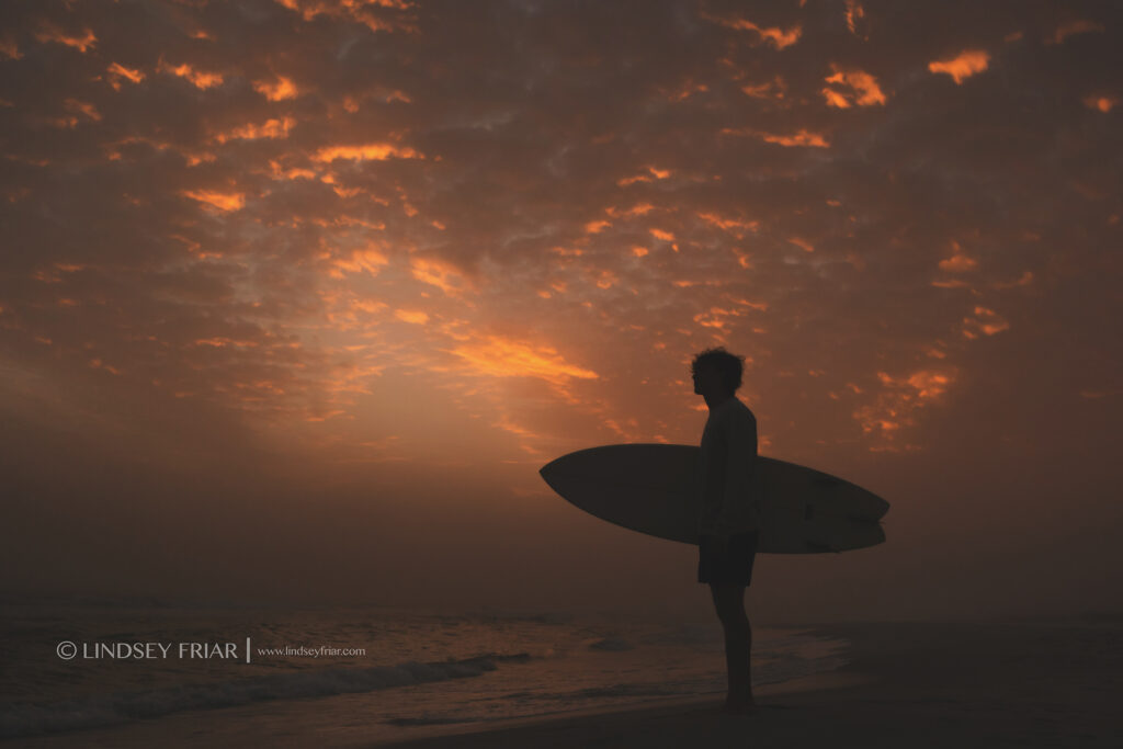 silhouette of a surfer