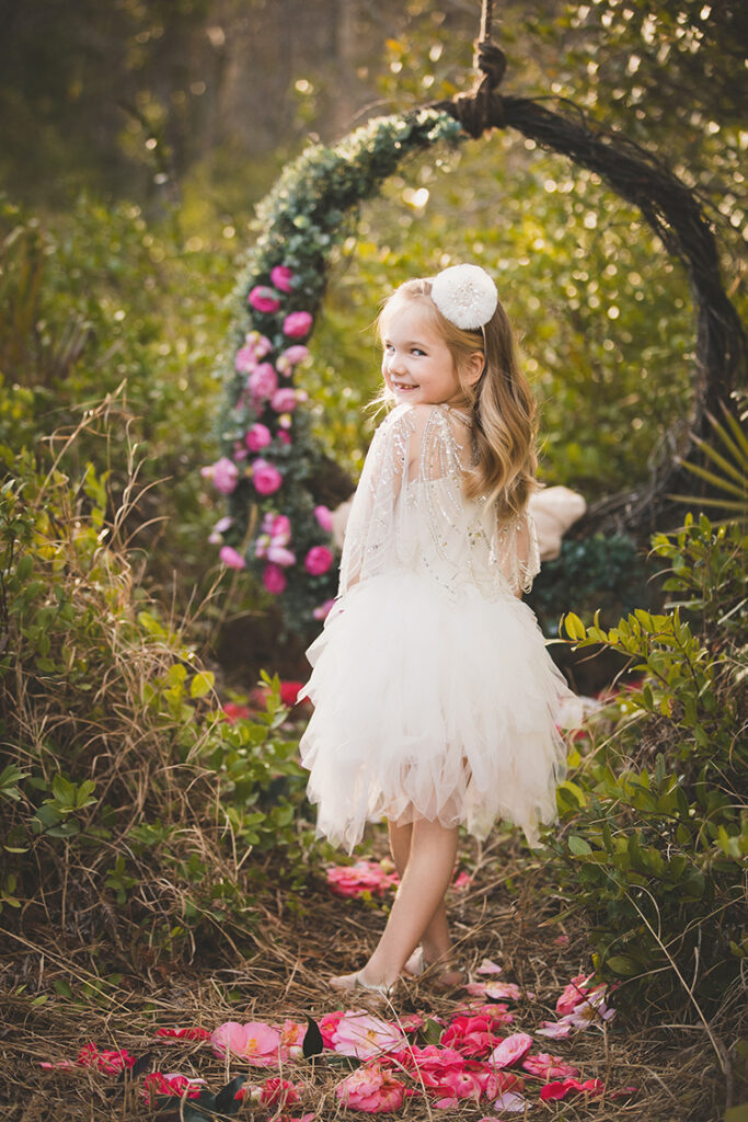 girl looking over shoulder waring sequins