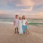 mom and 3 children posing for a photo